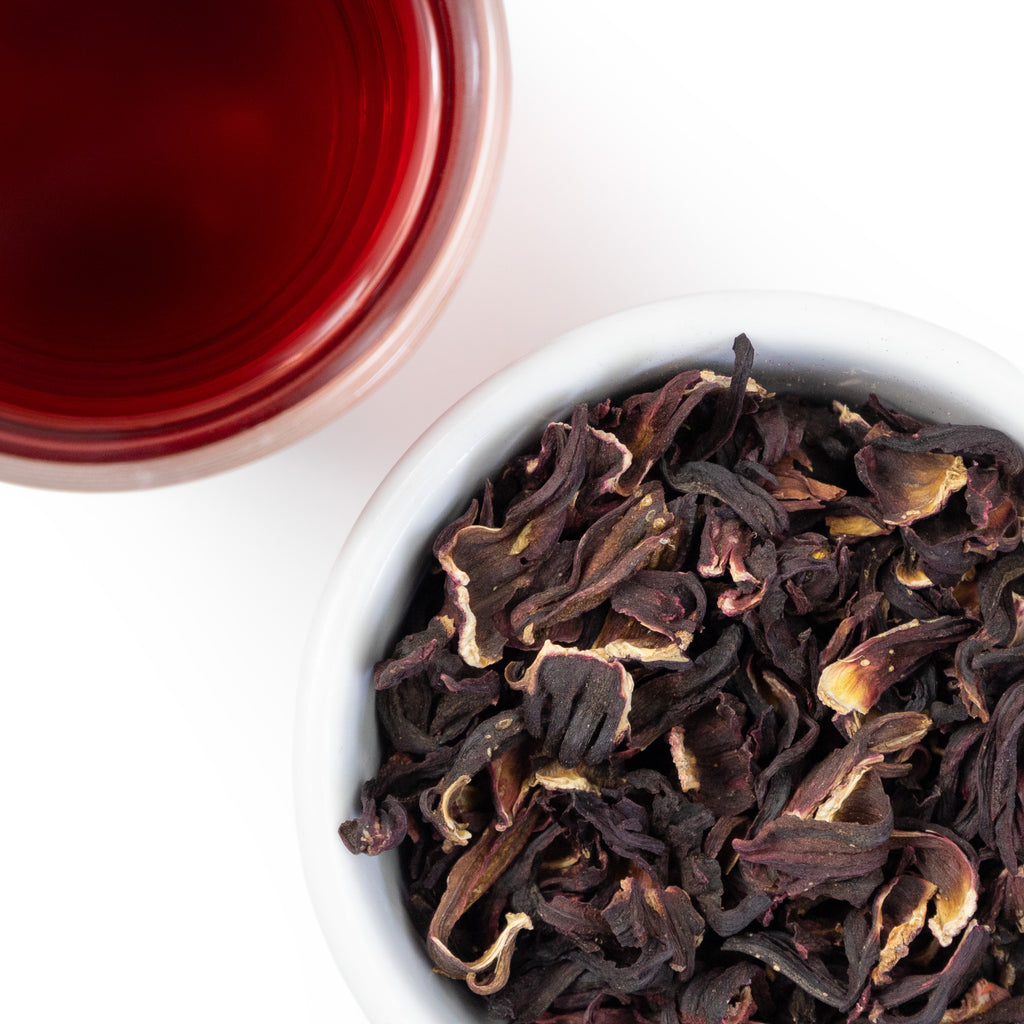 The Whistling Kettle Tea Hibiscus - Bold Leaf, loose leaf and brewed.