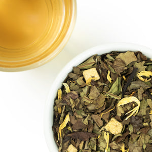 The Whistling Kettle Peach White tea with flower petals and dried fruit, loose leaf and brewed.