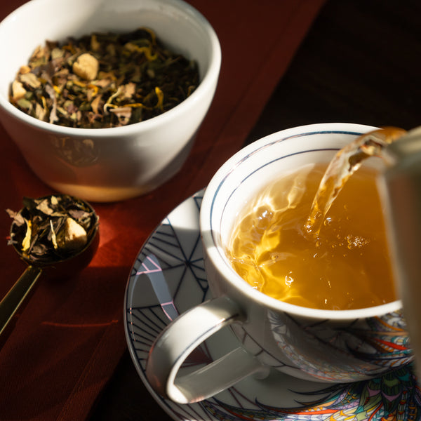 Peach Apricot being poured into Cup & Saucer.